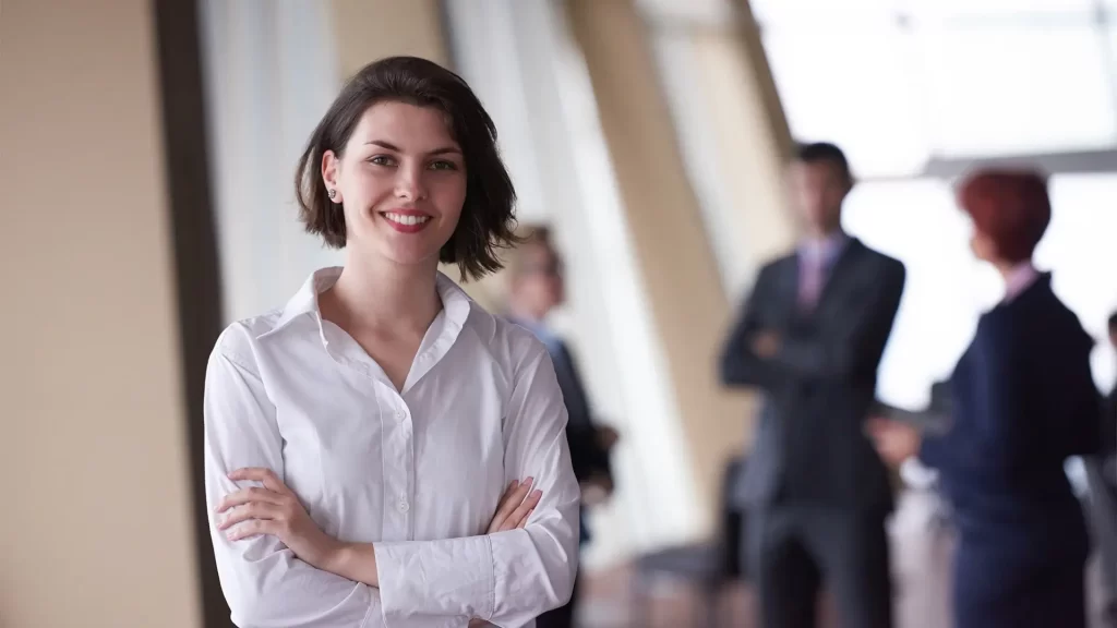 young businesswoman crossed arms and smiling